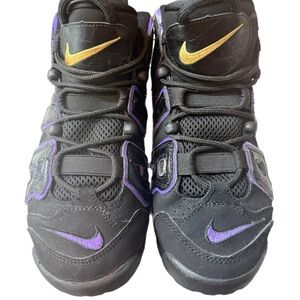 Nike Kids Black and Gold Sneakers with Purple Accents